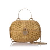 Chanel Heart Locket Wicker Satchel This satchel features a rattan body, a metal top handle, a