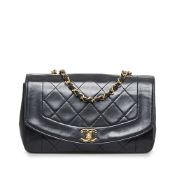 Chanel Medium Lambskin Diana Flap The Diana flap bag features a lambskin leather body, a leather-