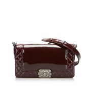Chanel Medium Patent Le Boy Flap Reverso The Patent Reverso Boy Bag features a patent leather