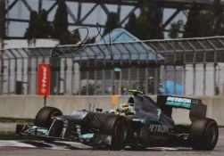 Eight motor sport signed photos,