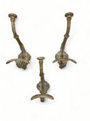 A set of four French enamel double coat hooks, a table lamp and a candelabra