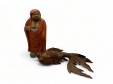 A 20th century Japanese carved box wood coy carp and a glazed male figure