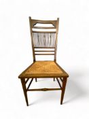 A late 19th century walnut side chair in the Anglo Japanese taste after a design by E.W Godwin