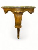 A small Italian giltwood and faux marble serpentine console table