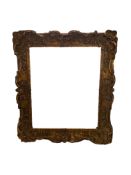 A late 19th century giltwood and composition picture frame