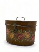 A Victorian painted oval tin hat box with later floral painted swags and a mirror / frame