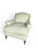 A Howard style armchair in light green weave upholstery possibly by George Smith