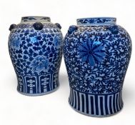Two similar Chinese blue and white stoneware baluster vases