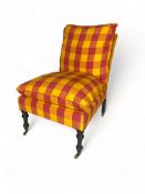 A late 19th / early 20th century red and orange check upholstered low side chair