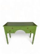 A Victorian later green painted kneehole dressing table