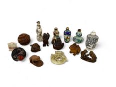 A group of Chinese and Japanese small works of art including netsuke and scent bottles