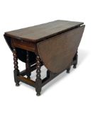 A Charles II oak gate-leg table