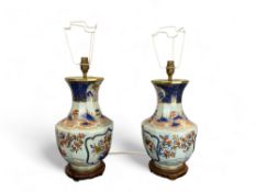 A pair of 20th century Imari style porcelain table lamp bases