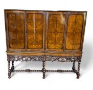 A 1930's Queen Anne style walnut double bowfront side / cocktail cabinet
