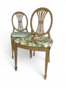 A pair of Hepplewhite style cream painted side chairs