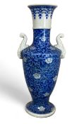 A 19th century Chinese blue and white slender baluster vase