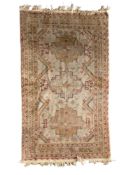 A vintage Ushak design rug