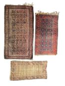 Three early to mid 20th century rugs, Afghan and North West Persian