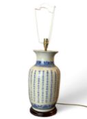 A Chinese blue and white table lamp