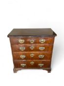 An 18th century and later walnut chest