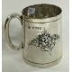 A novelty Victorian silver christening mug chased with flowers. London 1882. By Martin Hall & Co. - Image 1 of 2