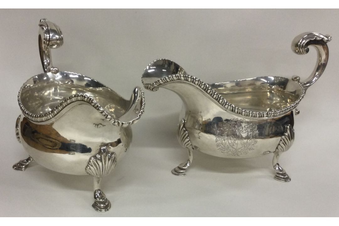 A good heavy pair of Georgian silver sauce boats with central armorials. London 1767. - Image 1 of 3
