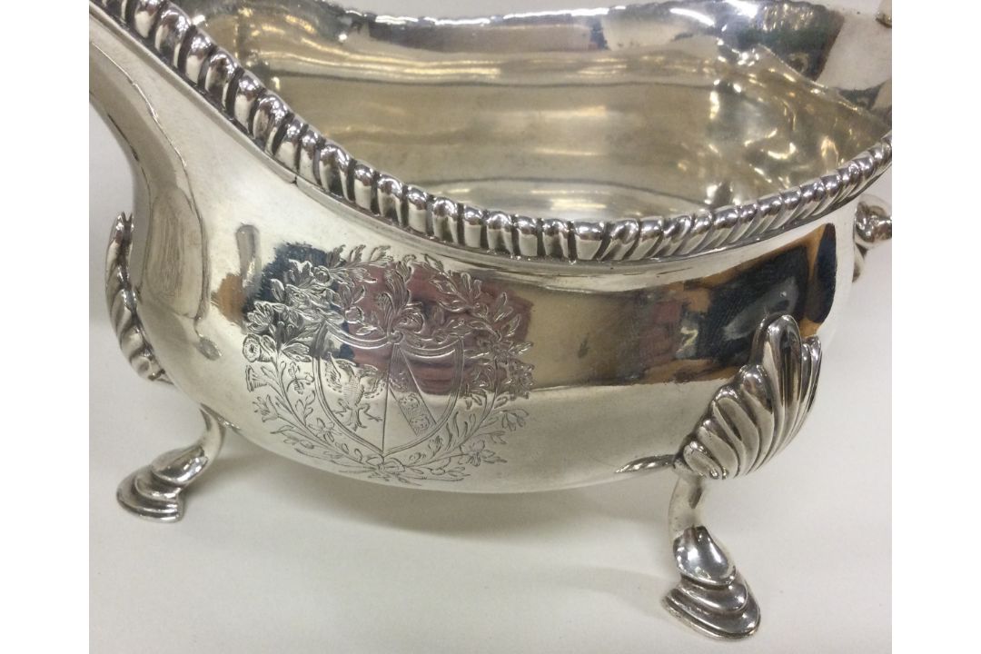 A good heavy pair of Georgian silver sauce boats with central armorials. London 1767. - Image 2 of 3