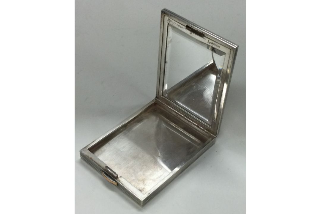 BOUCHERON: A gold and silver compact. - Image 2 of 2