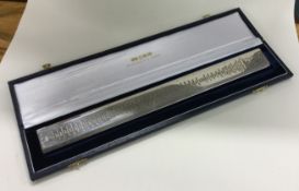 A cased Britannia Standard silver ruler depicting 'Rulers of Britain'. London 2001.