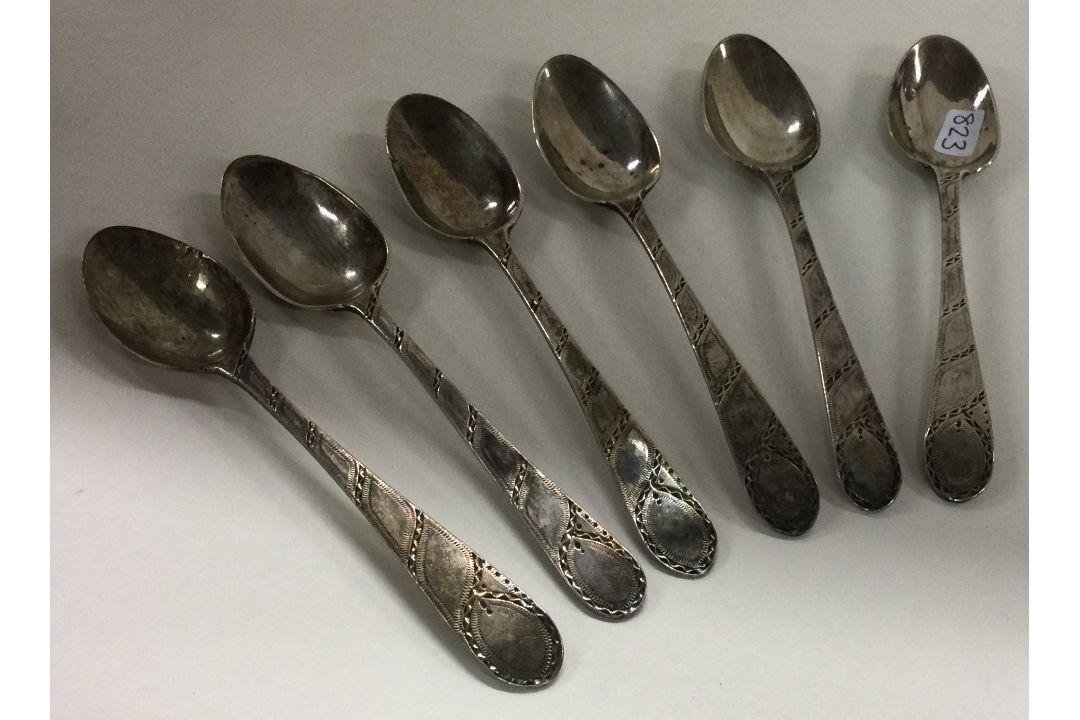 A set of six 18th Century silver bright-cut spoons. - Image 1 of 3