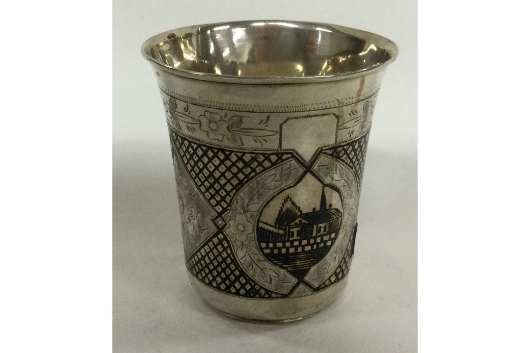 A 19th Century Russian silver and Niello beaker decorated with country scenes. 1886. - Image 1 of 2