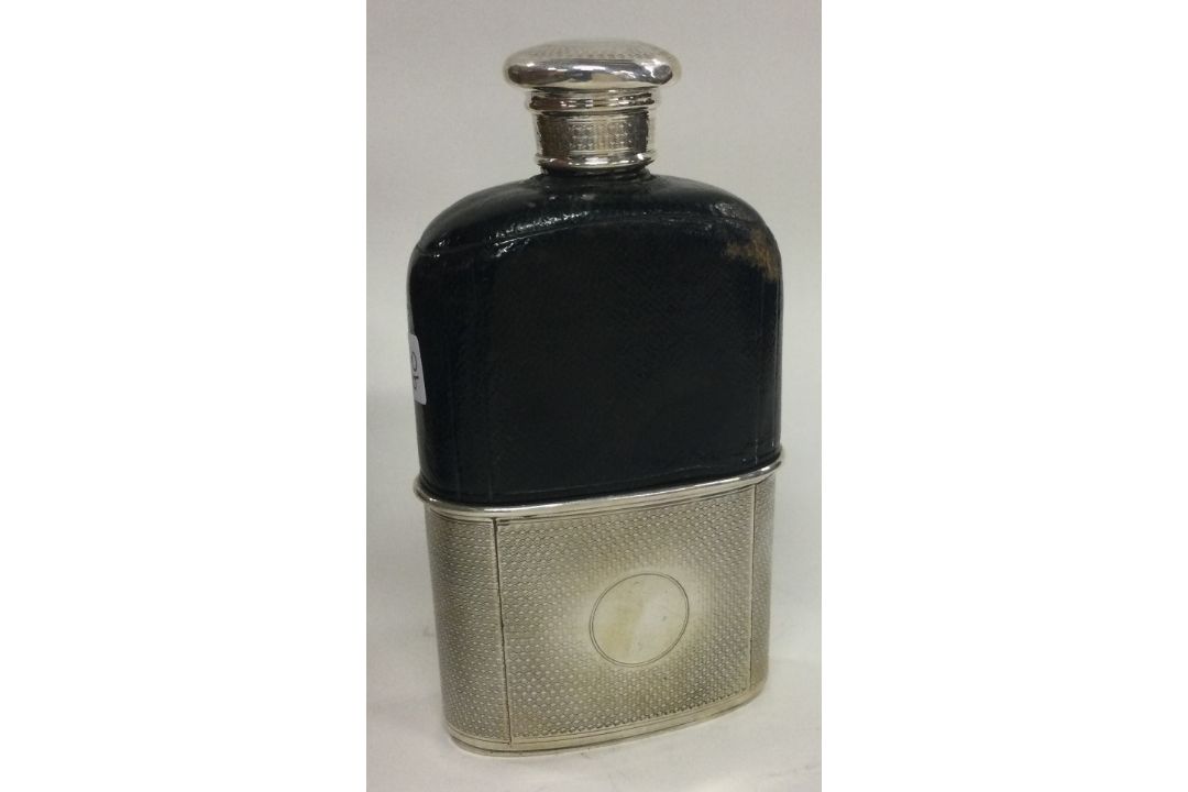A Victorian silver mounted glass flask. London 1845. By George Burrows. - Image 2 of 2