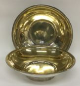 A pair of 19th Century Russian silver bowls. Marked to bases and dated 1873.