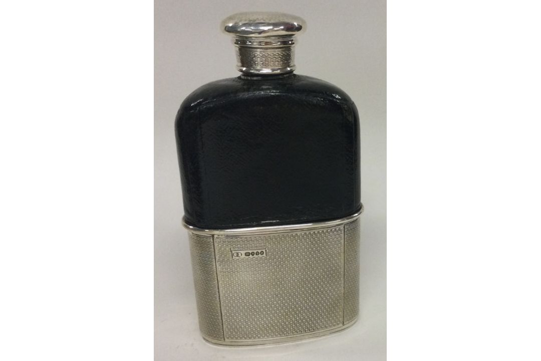 A Victorian silver mounted glass flask. London 1845. By George Burrows. - Image 1 of 2