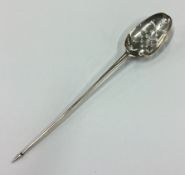 An 18th Century silver shell back mote spoon.