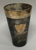 INVERNESS: A Scottish silver and tortoiseshell beaker and spoon.