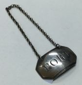 An 18th Century silver wine label for 'Port'.