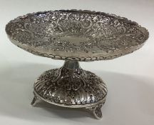 An ornate Victorian silver sweet dish.