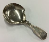 A heavy William IV silver caddy spoon.