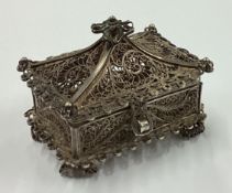 A 19th Century Russian silver filigree casket with hinged cover.