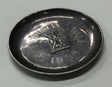 A Chinese export silver coin dish chased with figure to centre.