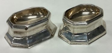 A good pair of Georgian style silver trencher salts with crested decoration.