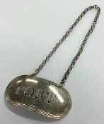 A good Georgian silver wine label for 'Port'.