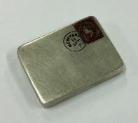 A rare novelty American silver and enamelled stamp case.