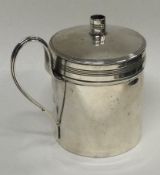 A George III silver wax jack with lift-off cover.