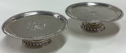 A good pair of 17th Century silver tazzas with central armorials.