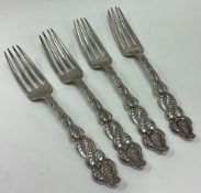 TIFFANY & CO: A set of four silver forks.