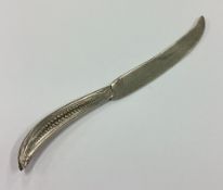 TIFFANY & CO: A rare silver page turner with beaded handle.