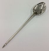An 18th Century Provincial silver cross pattern mote spoon.