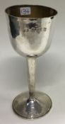 A Modernistic hammered silver goblet.